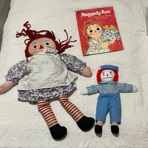 Vintage collectible Raggedy Ann dolls and book.